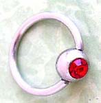 Body catalog jewelry wholesale. Pink cz gemstone inlaid in body ring for lip, eyebrow, nipple, or nose 
