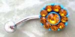 Hip hop navel jewelry wholesale outlet supplies Amber colored cz gems in floral design attached to surgical steel navel barbell 