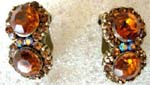 Online discount jewelry sale. Amber colored cz gemstone earrings with copper colored backing 