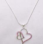 Costume accessory jewelry distribution supplier sells heart shaped, silver plated pendant with pink cz crystals