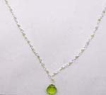 Quality gemstone online jewelry shop distributes Oval shaped green cz gemstone hanging from silver plated chain