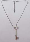 Wholesale costume fashion jewelry distribution catalog. Silver plated skeleton key necklace hanging from adjustable chain 