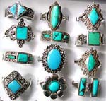 Turquoise gemstone distribution wholesale store supplies fashion rings with sterling silver frame around stone  